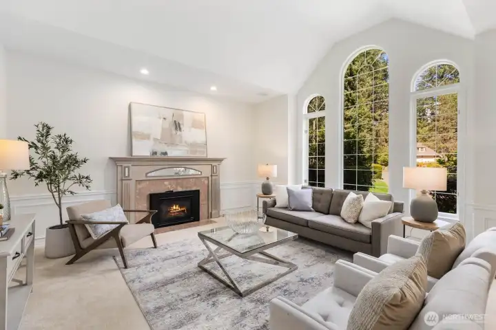 Inviting living room centered around a gas fireplace.