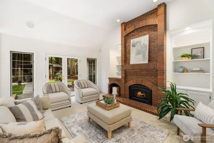 Light filled family room with soaring vaulted ceilings.
