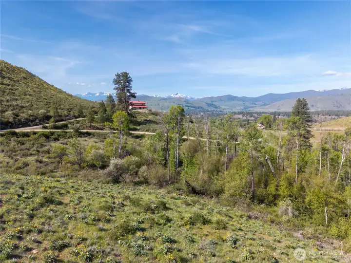 On a bench above Bear Creek, with over 1,500 ft of creek frontage and views of the Sawtooth Mountains. On a bench above Bear Creek, with over 1,500 ft of creek frontage and views of the Sawtooth Mountains.