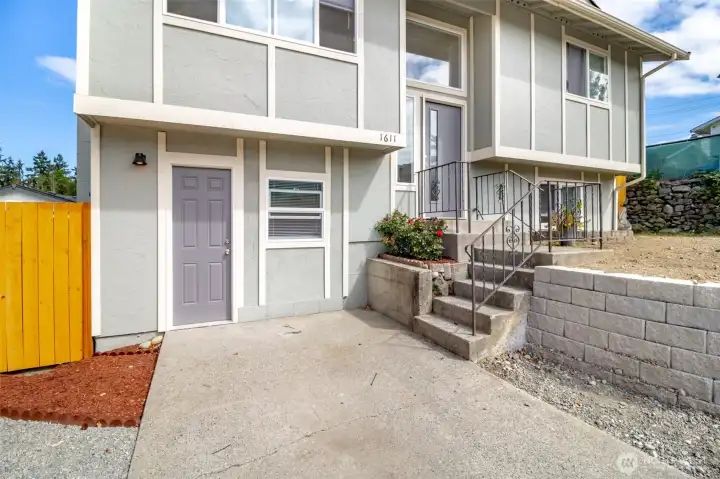 Separate entrances - no stairs entering lower level.