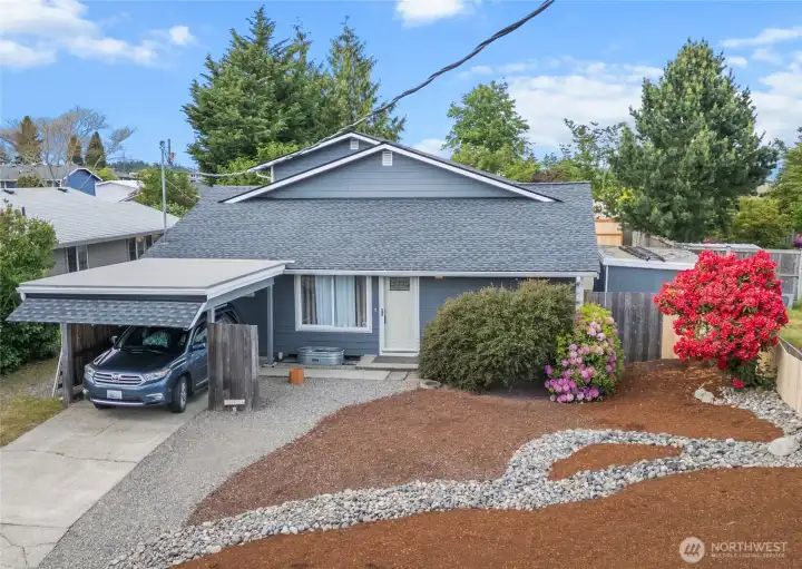 Wild lilac and rhodies- pops of color greet you as you pull up.