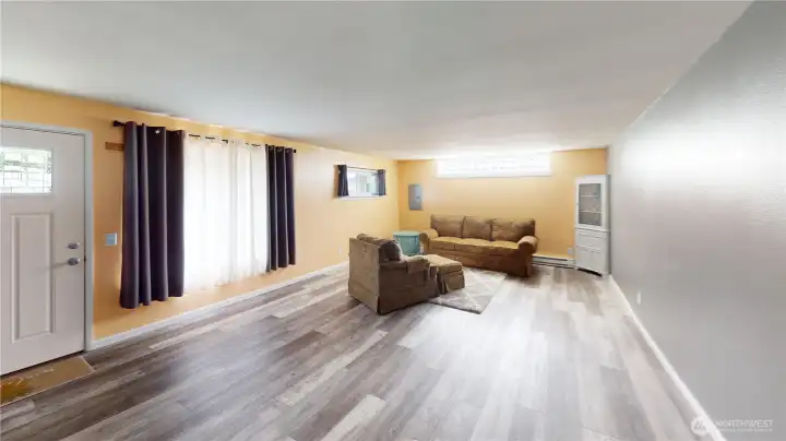 Step inside- newer flooring, windows, and front door.  Paint color choices are personal- how will you personalize?