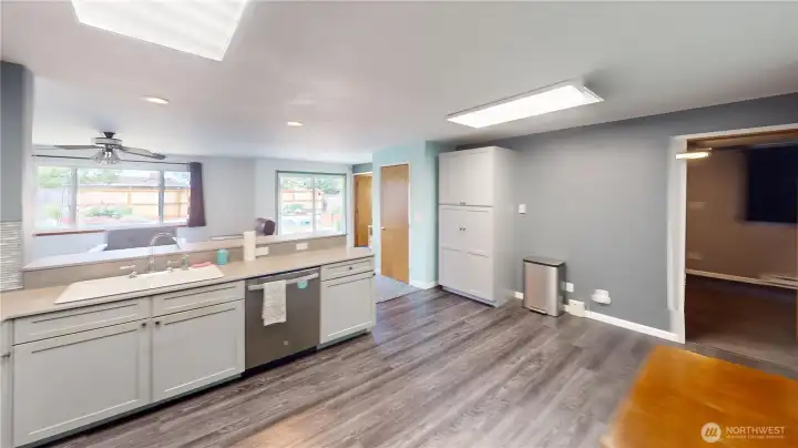 Big kitchen with tons of storage, fabulous countertops that are practically indestructible, beautiful cabinetry, and tile.