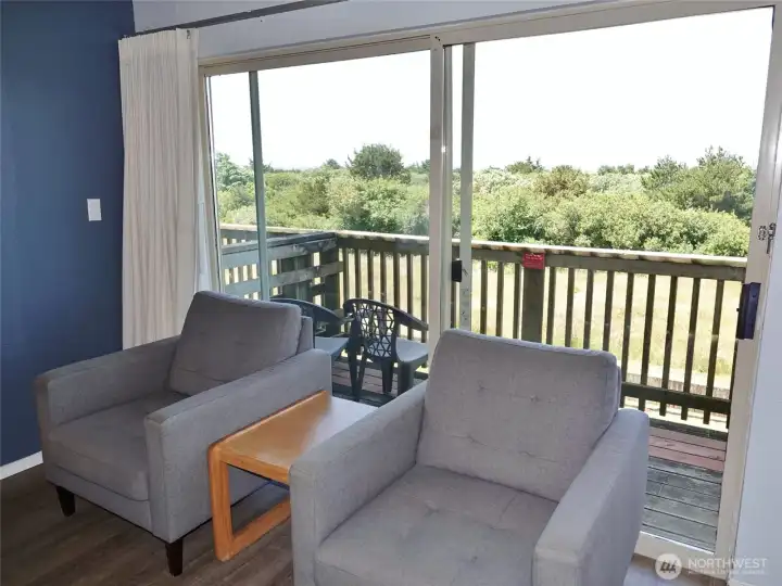 Sitting Area w/a huge slider glass door.