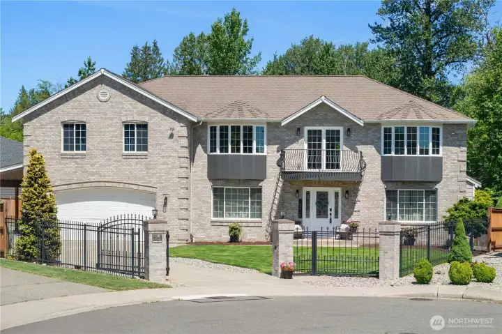 This home has a tandem 4 car garage as well as an additional carport and plenty of room for RV or boat parking behind it's iron gates. The gate comes with 4 remote controls This home has a tandem 4 car garage as well as an additional carport and plenty of room for RV or boat parking behind it's iron gates. The gate comes with 4 remote controls