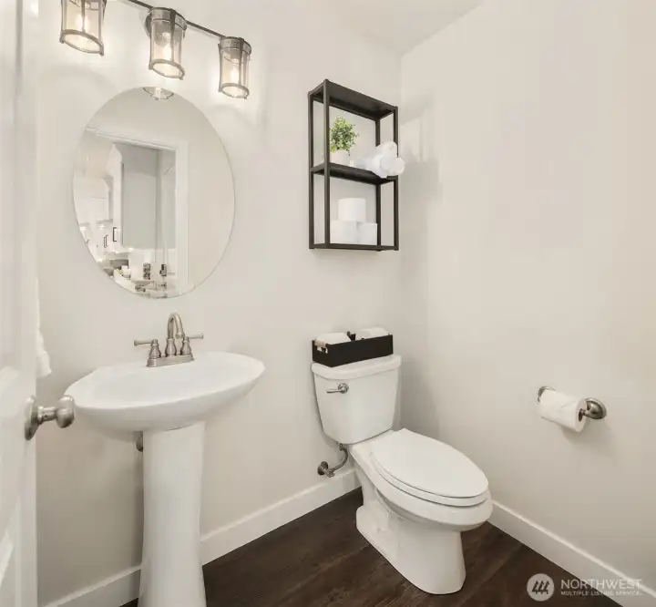A tidy powder room is offered on the first floor for your guests. A tidy powder room is offered on the first floor for your guests.