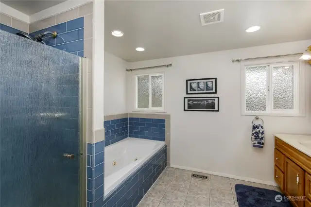 Full bath w/ separate shower; large jetted tub & tile floors