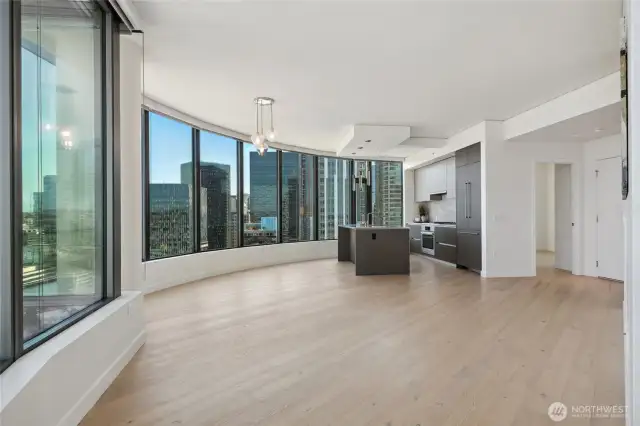Room for a large sectional , media center, coffee table & dining table