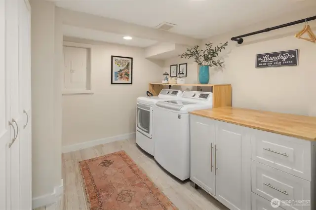 Utility room with storage closets.