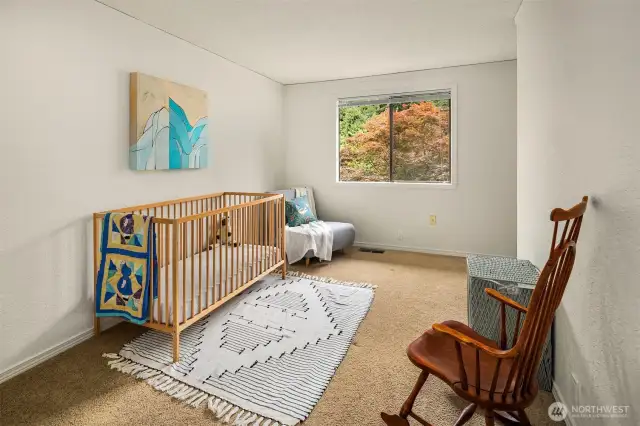 3rd bedroom wakes to the sunrise and view of the pretty neighborhood trees.
