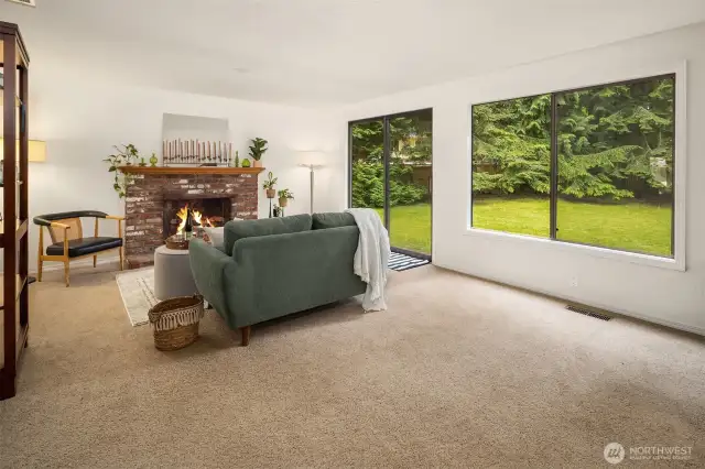 Back living room with plenty of natural light and easy access to the large back yard.