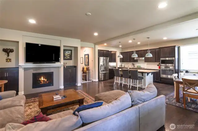 Great room concept living with open living room, kitchen and dining areas.