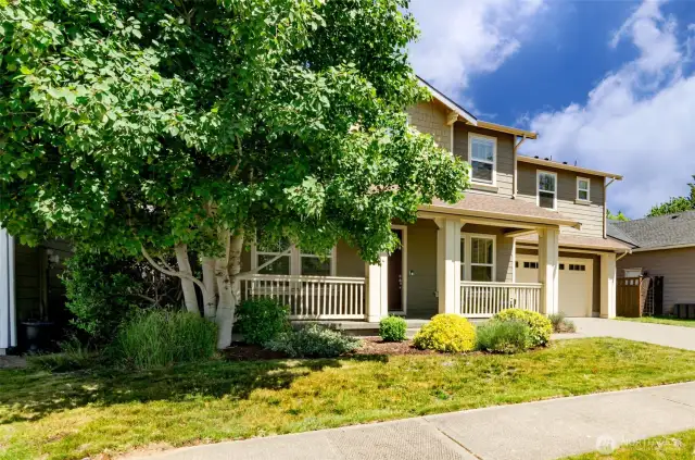 Inviting covered front porch.  Walking distance to community playgrounds and park.