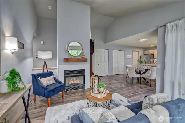 Living room adjacent to dining room and kitchen.