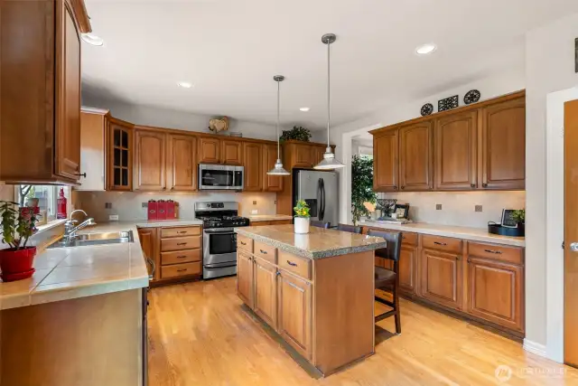 An island with room for three stools makes this the perfect breakfast spot.
