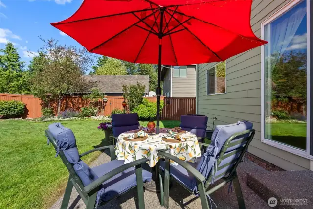Patio right off of the kitchen makes it easy to enjoy dinner outside