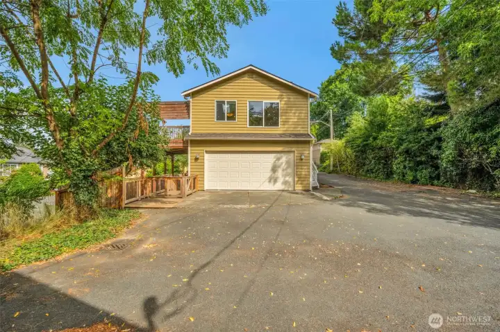 2 car garage, with extra parking in front of the home. Turn around access is there as well.