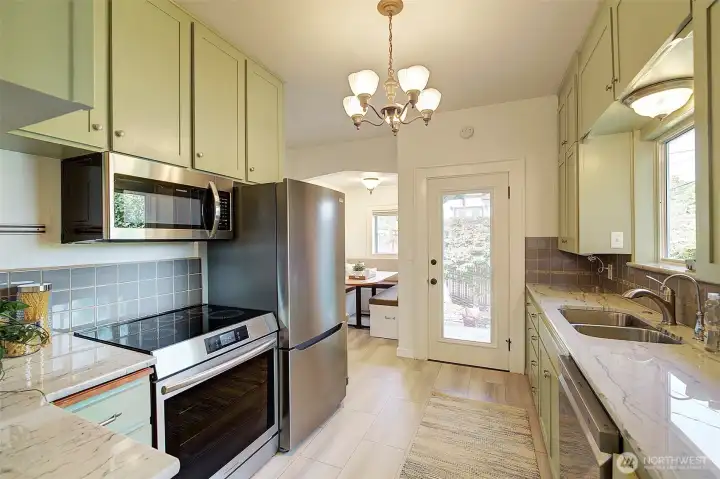 Updated kitchen boasts new appliance, fixtures and flooring!