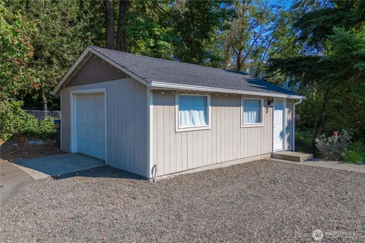 Detached 1 car garage has tons of space for storage and is wired for power.