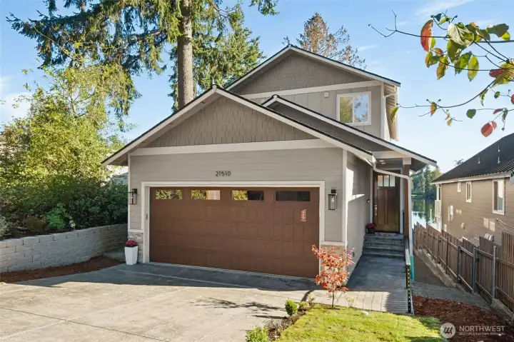 Rare opportunity to purchase a stunning new construction masterpiece offering modern elegance and lakeside serenity on beautiful Lake Lucerne. Every inch of this home is designed to capture the natural beauty of its surroundings while providing a refined living experience.