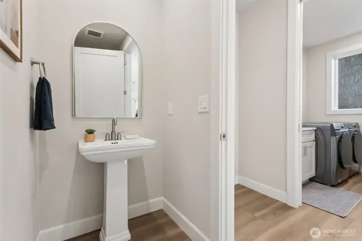 Conveniently located away from the main living area, this main floor half bath is both elegant and functional.