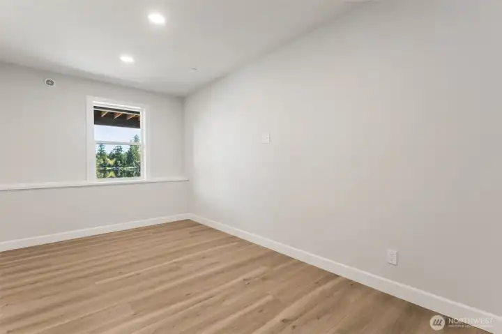 Bedroom #4 on lower level, with an adjacent large 3/4 bath.