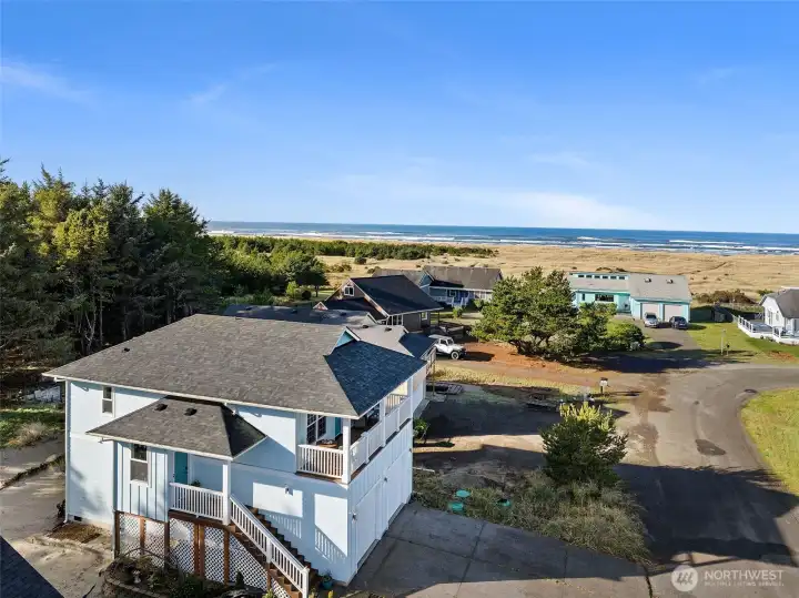 Enjoy stunning ocean views and coastal charm from this beautifully maintained 3-bedroom, 2.5-bath home in the desirable Tides West community.