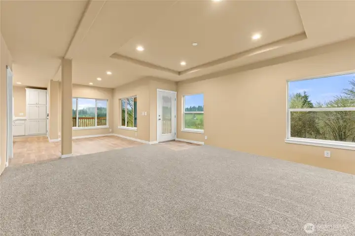 Visual of the dining room from the living room and kitchen to the left of the dining area.