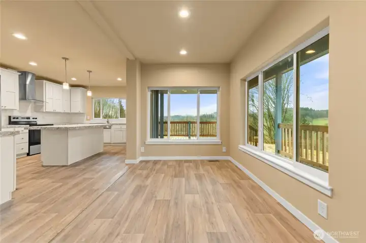From the dining area is a view of the large kitchen