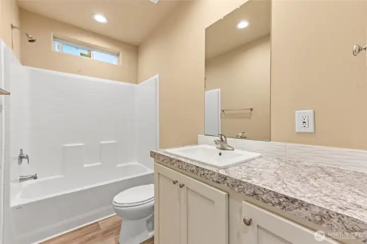 Guest bathroom off the hallway and in between guest bed 1 and 2