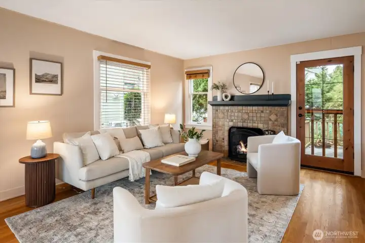 Large living room with access to outdoor deck