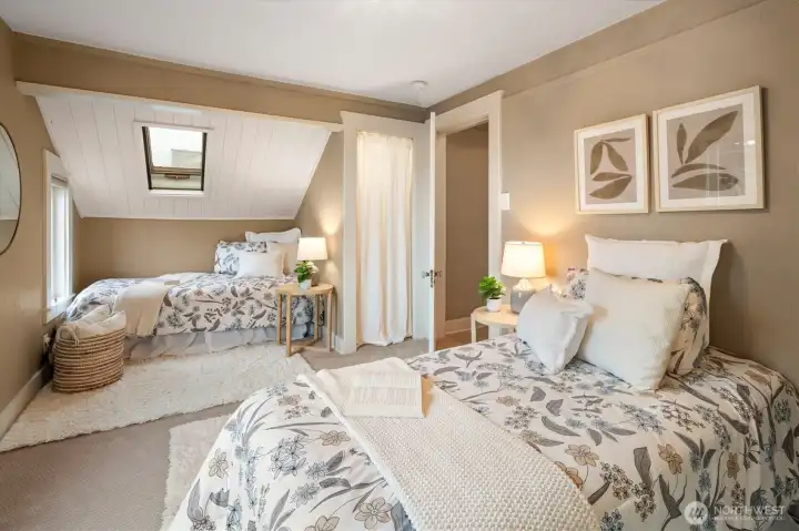 Second level large bedroom with skylights and ensuite