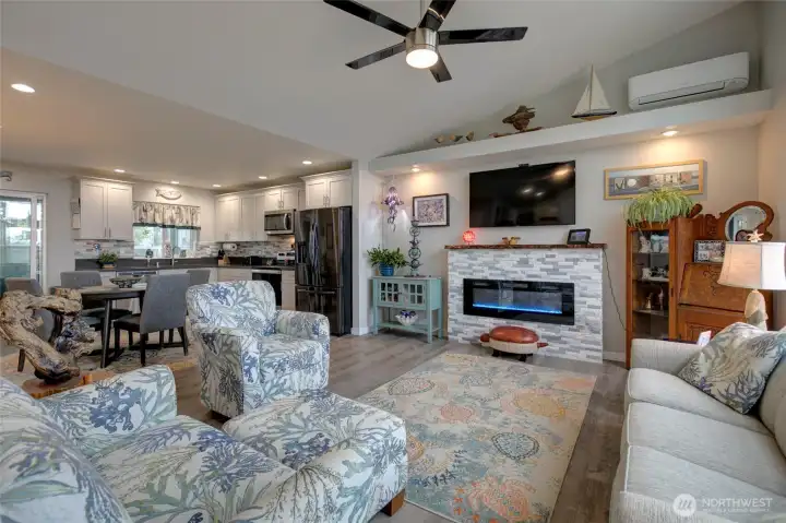 Greeted by coastal vibes and an electric fireplace, the warmth of this home will make you fall in love.