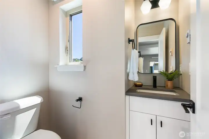 Not subject property. Staged similar unit. Powder room