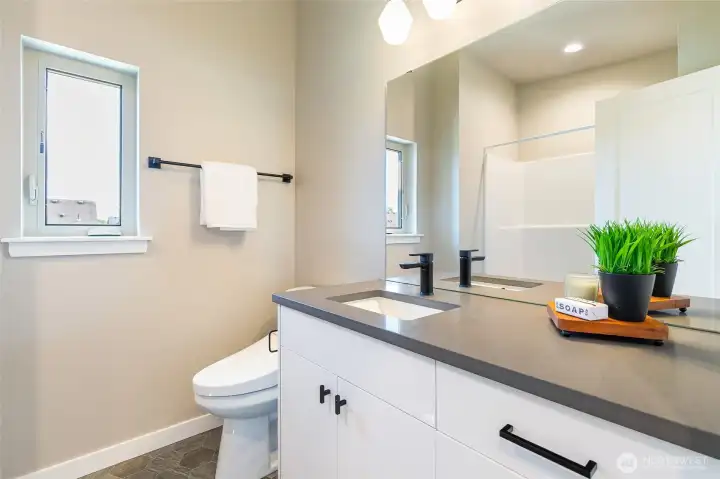 Not subject property. Staged similar unit. Upstairs full bath