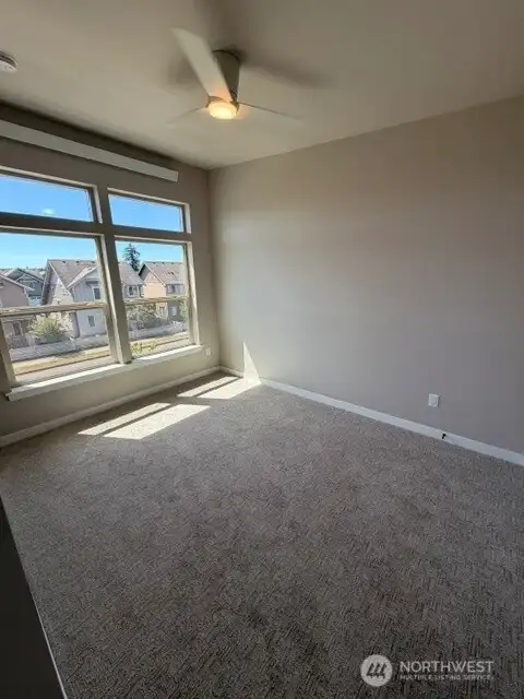 Subject property. Main bedroom flooded with natural light