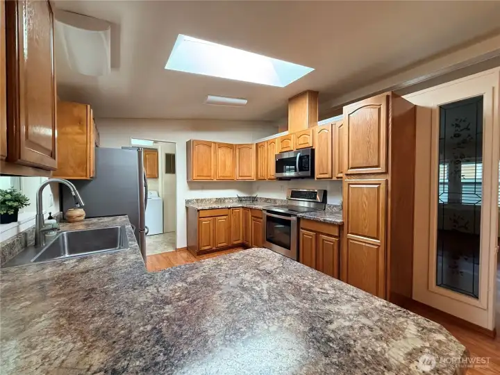 Closer view of the kitchen.