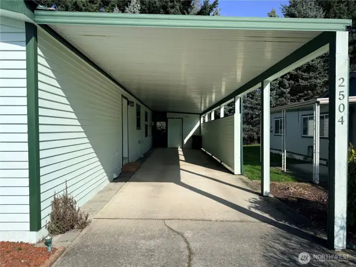 Now back at the front of the home, a view of the carport.
