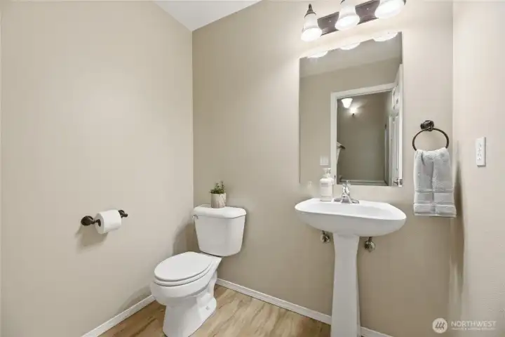 Main level bathroom with pedestal sink