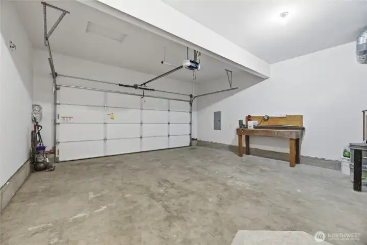 Garage with all new drywall and paint.  2 year old insulated garage door