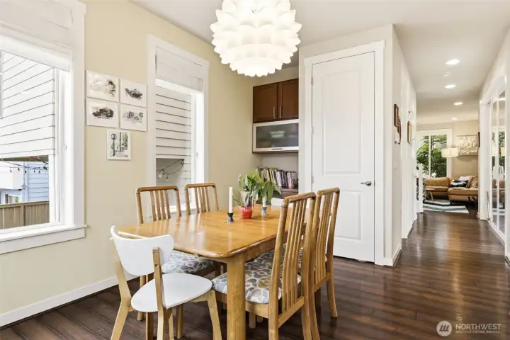 Space saving built-in desk and tech garage allows for easy storage and work area.