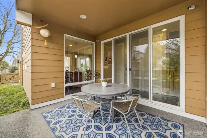 Double doors opens to covered patio providing a seamless indoor-outdoor connection for everyday living and entertaining.