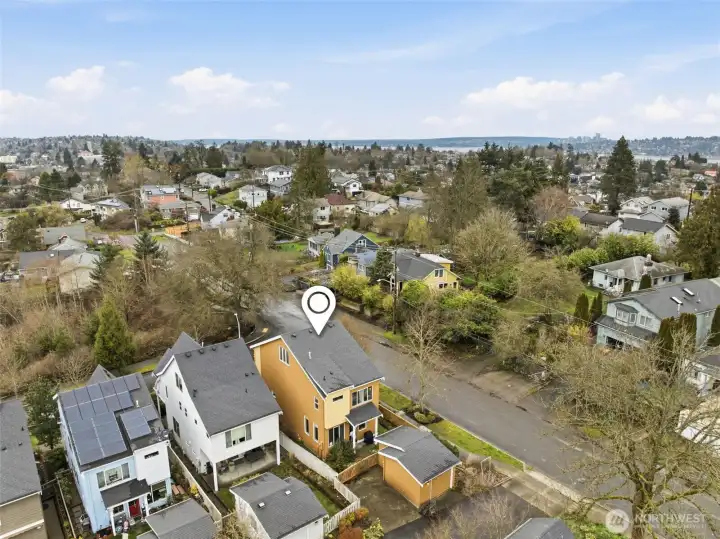 Seattle skyline views from bedroom of this well laid out home on corner lot.
