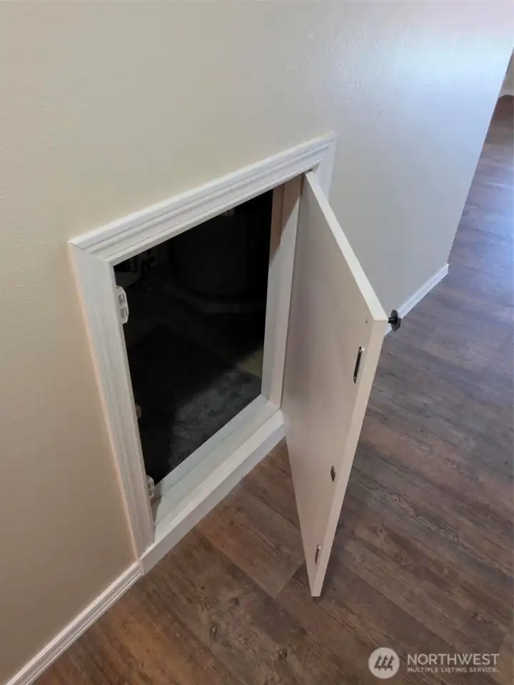 Family room under stairs storage door. Family room under stairs storage door.