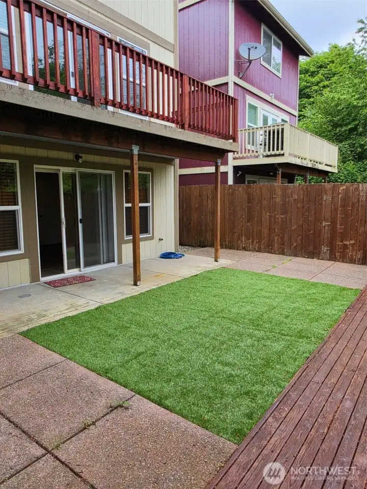 Another shot of back yard patio. Fairly private other than neighbors deck. Another shot of back yard patio. Fairly private other than neighbors deck.