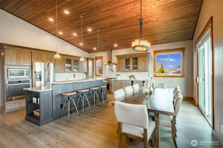 Beautiful wood vaulted ceilings, and all new cabinetry and fixtures.