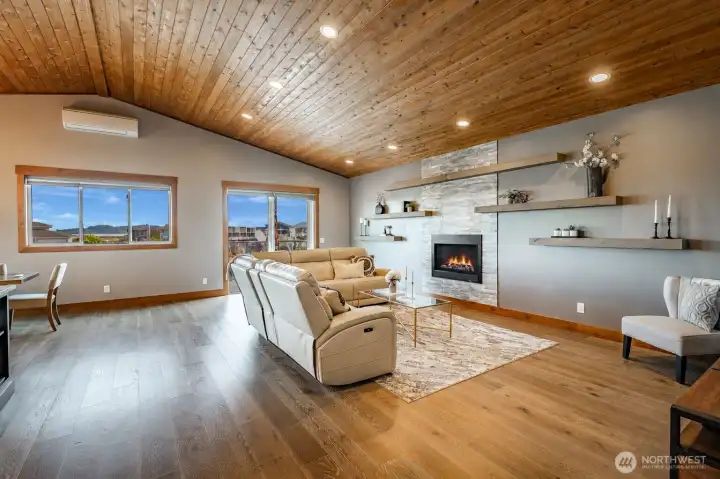 Spacious great room with wall of windows for lots of light.