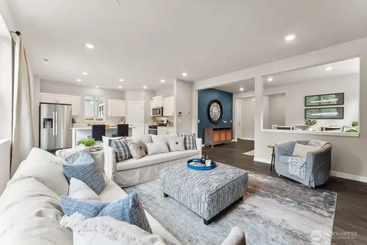 Bright spaces for gathering. Photo rendering is representational and may be virtually staged. Actual home is under construction and finishes, elevation, and paint colors may vary. See site agent for details. Bright spaces for gathering. Photo rendering is representational and may be virtually staged. Actual home is under construction and finishes, elevation, and paint colors may vary. See site agent for details.