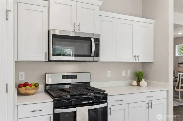 Photo rendering is representational and may be virtually staged. Actual home is under construction and finishes, elevation, and paint colors may vary. See site agent for details.