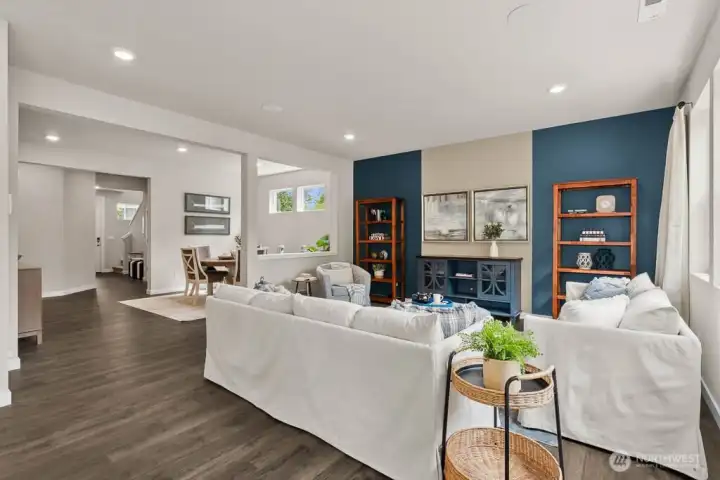 Hardsurface flooring throughout main living space. Photo rendering is representational and may be virtually staged. Actual home is under construction and finishes, elevation, and paint colors may vary. See site agent for details. Hardsurface flooring throughout main living space. Photo rendering is representational and may be virtually staged. Actual home is under construction and finishes, elevation, and paint colors may vary. See site agent for details.
